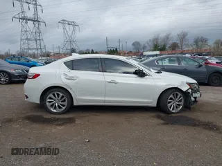 2016 Acura ILX z VIN 19UDE2F33GA013007, wystawiony jako IAAI lot #41902439 z przebiegiem 123 447 mil mil oraz . Historia ofert i sprzedaży dostępna na DreamBid. Obrazek 14.