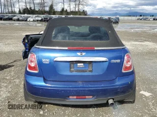 2014 MINI Convertible with VIN WMWZN3C55ET861078, listed as a Copart auction lot 50240665 with 50,541 mi miles and Salvage Title. Bid and sale history available at DreamBid. Image 6.