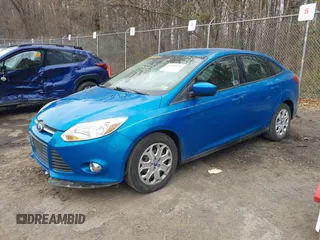 2012 Ford Focus SE with VIN 1FAHP3F26CL254085, listed as a IAAI auction lot 41901816 with 123,380 mi miles. Bid and sale history available at carsss.com. Image 2.
