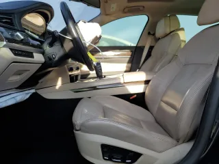2012 BMW 7 Series 750Li with VIN WBAKB8C52CDW84794, listed as a Copart auction lot 49874315 with 118,725 mi miles and Salvage Title. Bid and sale history available at carsss.com. Image 7.