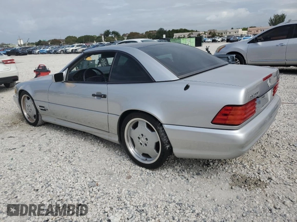 1997 Mercedes-Benz SL-Class with VIN WDBFA67F2VF151123, listed as a Copart auction lot 52703395 with 76,649 mi miles and Non Repairable. Bid and sale history available at carsss.com. Image 2.