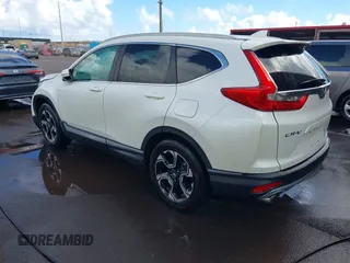 2018 Honda CR-V Touring with VIN 2HKRW1H96JH506435, listed as a IAAI auction lot 41228873 with 11,585 mi miles and . Bid and sale history available at DreamBid. Image 3.