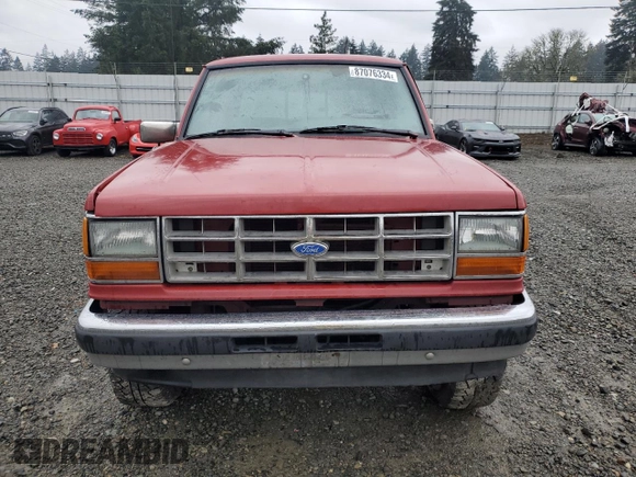 1990 Ford Ranger XLT with VIN 1FTCR15X6LPB44730, listed as a Copart auction lot 87076334 with 91,204 mi miles and Salvage Title. Bid and sale history available at DreamBid. Image 5.