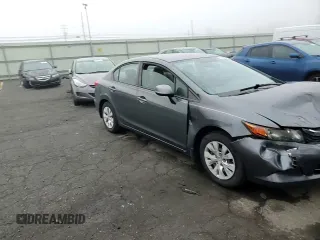 2012 Honda Civic LX z VIN 2HGFB2F50CH324974, wystawiony jako Copart lot #57442305 z przebiegiem 124 462 mil mil oraz Szkoda całkowita • Salvage title. Historia ofert i sprzedaży dostępna na DreamBid. Obrazek 13.