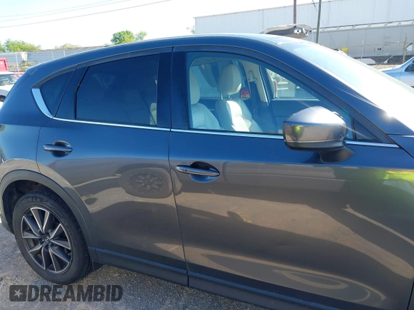 2018 Mazda CX-5 Grand Touring with VIN JM3KFBDM7J0454836, listed as a IAAI auction lot 42001397 with 146,879 mi miles. Bid and sale history available at carsss.com. Image 13.