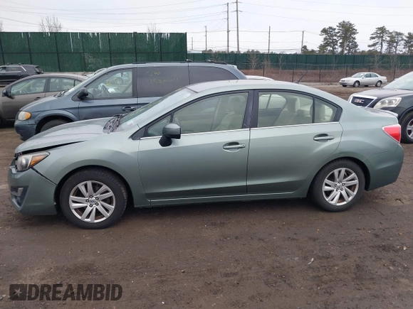 2015 Subaru Impreza Premium z VIN JF1GJAC65FH019578, wystawiony jako IAAI lot #41675318 z przebiegiem 74 769 mil mil oraz . Historia ofert i sprzedaży dostępna na DreamBid. Obrazek 14.
