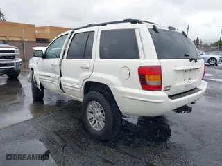 2004 Jeep Grand Cherokee Limited with VIN 1J4GW58S24C417604, listed as a IAAI auction lot 41578234 with 1 mi miles. Bid and sale history available at carsss.com. Image 3.