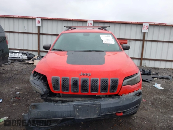 2019 Jeep Cherokee Trailhawk with VIN 1C4PJMBX4KD337408, listed as a IAAI auction lot 41788054 with 42,365 mi miles and . Bid and sale history available at DreamBid. Image 12.