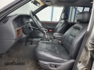 1997 Jeep Grand Cherokee Limited with VIN 1J4GZ78Y0VC682949, listed as a Copart auction lot 82152424 with 194,576 mi miles and Salvage Title. Bid and sale history available at carsss.com. Image 7.