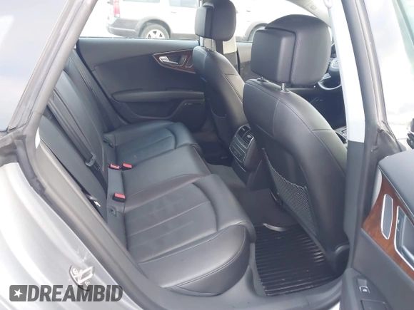 2014 Audi A7 Premium Plus z VIN WAUWGAFC9EN096702, wystawiony jako IAAI lot #41202201 z przebiegiem 103 893 mil mil oraz . Historia ofert i sprzedaży dostępna na DreamBid. Obrazek 8.