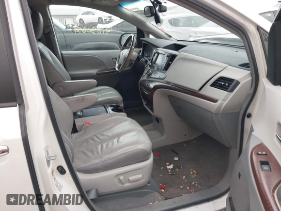 2011 Toyota Sienna XLE AAS with VIN 5TDYK3DC8BS003313, listed as a IAAI auction lot 41830631 with 214,514 mi miles and . Bid and sale history available at DreamBid. Image 5.