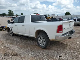 2015 Ram 2500 Laramie with VIN 3C6UR5NL4FG569422, listed as a Copart auction lot 62017655 with 100,400 mi miles and Salvage title. Bid and sale history available at DreamBid. Image 2.
