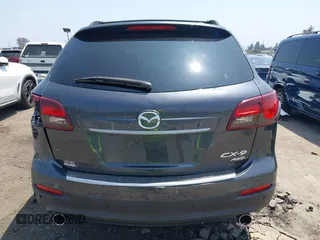 2015 Mazda CX-9 Grand Touring with VIN JM3TB3DA0F0459024, listed as a IAAI auction lot 42452288 with 174,716 mi miles and . Bid and sale history available at DreamBid. Image 16.
