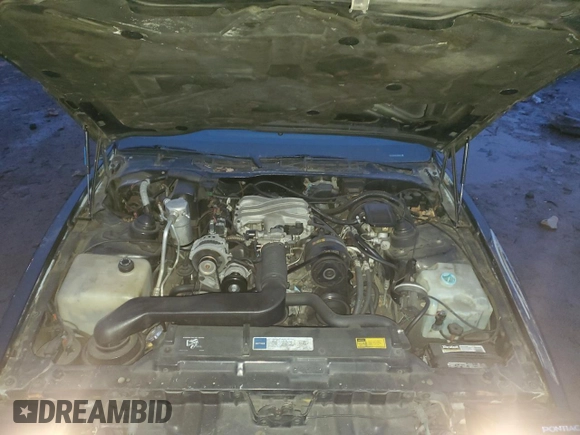 1990 Pontiac Firebird with VIN 1G2FS23TXLL205077, listed as a Copart auction lot 44035705 with 142,809 mi miles and Salvage title. Bid and sale history available at DreamBid. Image 12.