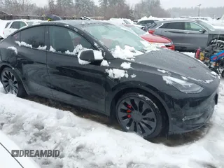 2023 Tesla Model Y Performance with VIN 7SAYGDEF4PF797192, listed as a IAAI auction lot 41550259 with 13,312 mi miles and . Bid and sale history available at DreamBid. Image 13.