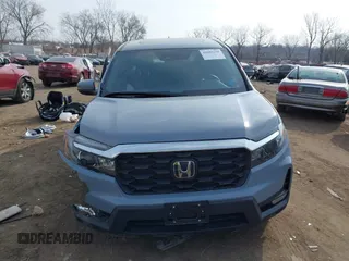 2024 Honda Passport EX-L with VIN 5FNYF8H54RB015972, listed as a IAAI auction lot 41904138 with 9,638 mi miles and . Bid and sale history available at DreamBid. Image 12.