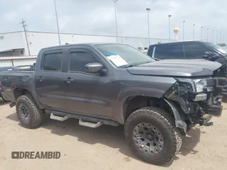 2022 Nissan Frontier SV with VIN 1N6ED1EK4NN650046, listed as a IAAI auction lot 41940072 with 48,967 mi miles and . Bid and sale history available at DreamBid. Image 14.