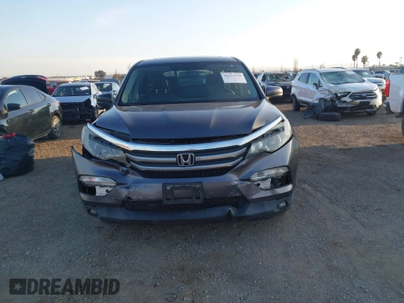 2017 Honda Pilot EX-L with VIN 5FNYF5H74HB010026, listed as a IAAI auction lot 41633770 with 170,383 mi miles and . Bid and sale history available at DreamBid. Image 13.