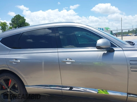 2021 Genesis GV80 with VIN KMUHCESC7MU038058, listed as a IAAI auction lot 42452578 with 63,980 mi miles and . Bid and sale history available at DreamBid. Image 14.