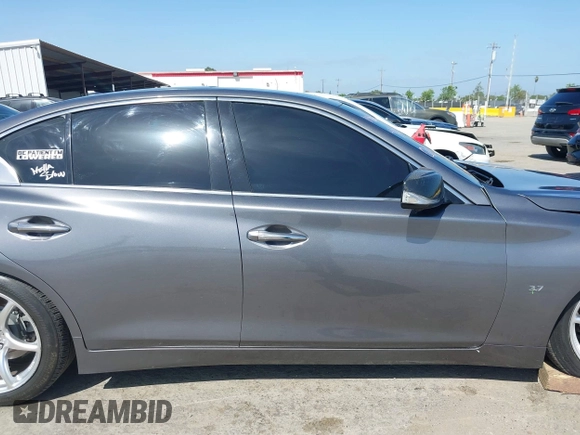 2014 Infiniti Q50 Premium with VIN JN1BV7AP5EM672766, listed as a IAAI auction lot 42107952 with 66,929 mi miles. Bid and sale history available at carsss.com. Image 13.