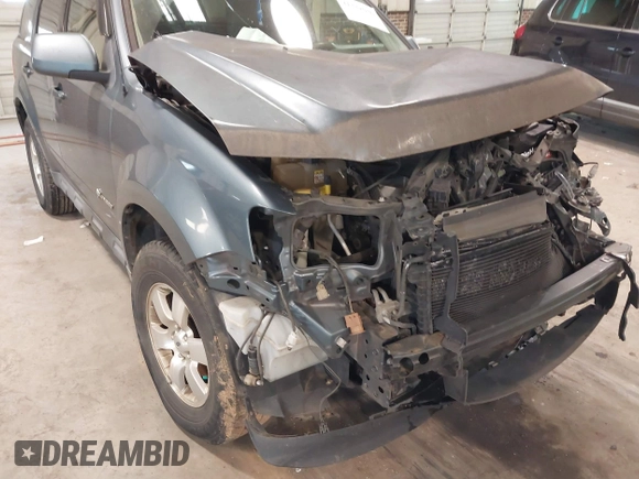 2010 Ford Escape Hybrid with VIN 1FMCU4K31AKC15842, listed as a IAAI auction lot 41332030 with 490,296 mi miles and . Bid and sale history available at DreamBid. Image 14.