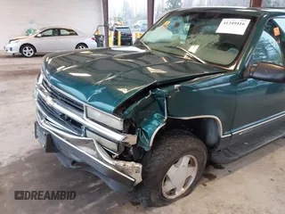 1997 Chevrolet Suburban with VIN 3GNFK16R6VG118242, listed as a IAAI auction lot 41349416 with 183,439 mi miles. Bid and sale history available at carsss.com. Image 6.