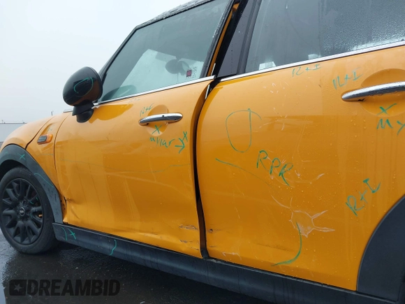 2018 MINI Hardtop 4 Door Cooper with VIN WMWXU1C59J2F79169, listed as a IAAI auction lot 40973679 with 97,507 mi miles and . Bid and sale history available at DreamBid. Image 17.