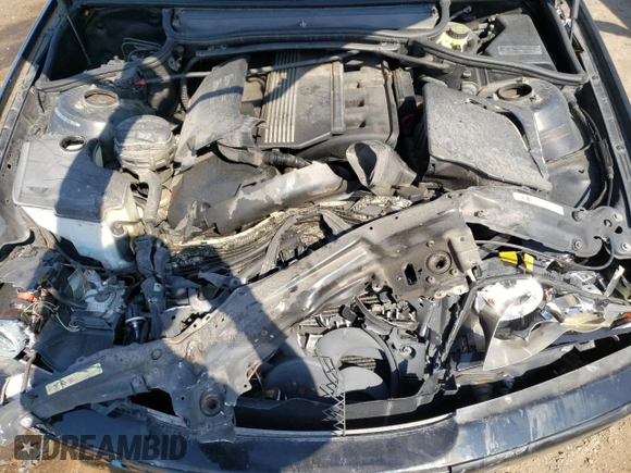 2003 BMW 3 Series 330xi with VIN WBAEW53413PG21999, listed as a Copart auction lot 60724374 with 137,242 mi miles and Salvage Title. Bid and sale history available at carsss.com. Image 11.