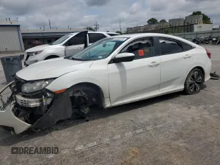 2016 Honda Civic EX-L с VIN 2HGFC1F74GH650713, выставлен на аукционе Copart как лот 58959515 с пробегом Не указан миль и Списание • Salvage title. История ставок и продаж доступна на DreamBid. Изображение 1.