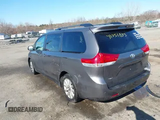 2014 Toyota Sienna Ltd with VIN 5TDDK3DC4ES083230, listed as a IAAI auction lot 41751843 with 184,501 mi miles. Bid and sale history available at carsss.com. Image 3.