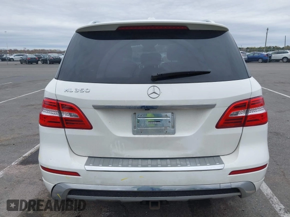 2014 Mercedes-Benz M 350 with VIN 4JGDA5JB2EA282733, listed as a IAAI auction lot 42070426 with 148,513 mi miles and . Bid and sale history available at DreamBid. Image 16.
