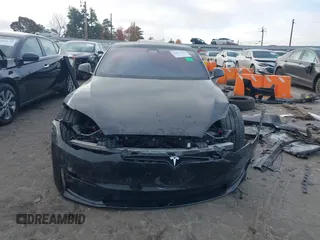 2022 Tesla Model S Plaid with VIN 5YJSA1E6XNF460235, listed as a IAAI auction lot 40951359 with 18,922 mi miles and . Bid and sale history available at DreamBid. Image 12.