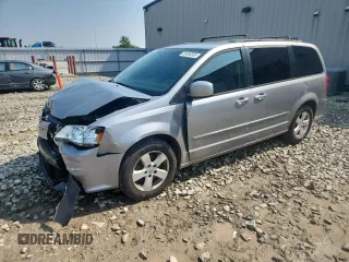 2014 Dodge Grand Caravan SXT z VIN 2C4RDGCG1ER323225, wystawiony jako Copart lot #59558505 z przebiegiem 149 365 mil mil oraz Nie do naprawy • Non repairable. Historia ofert i sprzedaży dostępna na DreamBid. Obrazek 1.