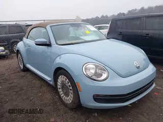 2015 Volkswagen Beetle 1.8T w/Tech with VIN 3VW517AT9FM802294, listed as a IAAI auction lot 41516005 with 110,184 mi miles and . Bid and sale history available at DreamBid. Image 1.