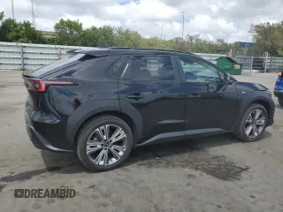 2023 Subaru Solterra Premium с VIN JTMABABA7PA044284, выставлен на аукционе Copart как лот 54517245 с пробегом 6 647 миль миль и На запчасти • Non repairable. История ставок и продаж доступна на DreamBid. Изображение 3.