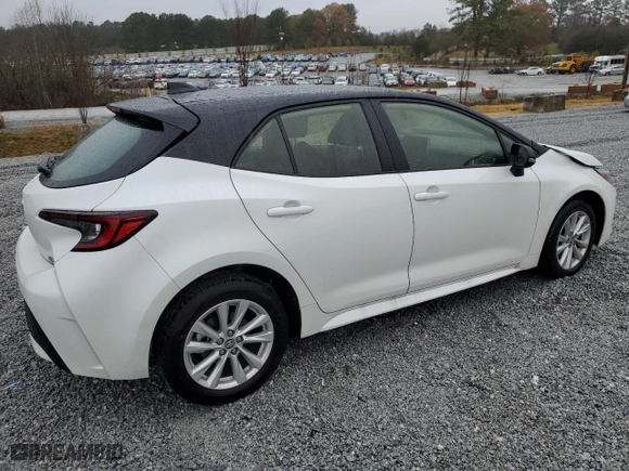 2025 Toyota Corolla Hatchback SE with VIN JTND4MBE4S3234970, listed as a Copart auction lot 84327214 with 5,764 mi miles and Salvage Title. Bid and sale history available at carsss.com. Image 3.