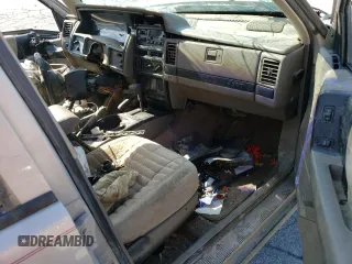 1994 Jeep Grand Cherokee Laredo z VIN 1J4GZ58S5RC328902, wystawiony jako Copart lot #70150474 z przebiegiem 195 604 mil mil oraz Szkoda całkowita • Salvage title. Historia ofert i sprzedaży dostępna na DreamBid. Obrazek 8.