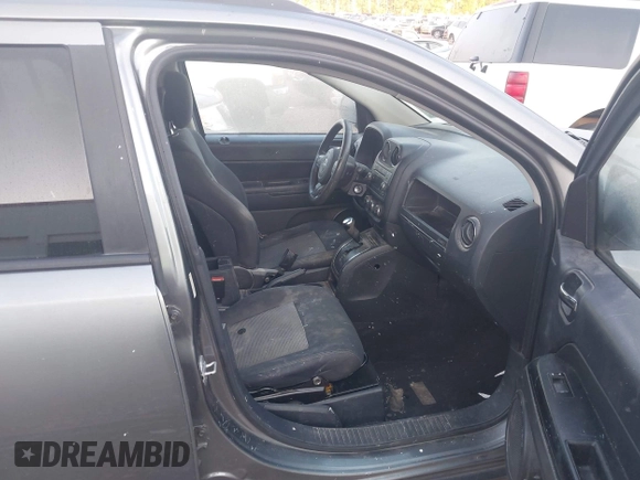 2011 Jeep Compass Latitude with VIN 1J4NT1FB4BD260158, listed as a IAAI auction lot 42013286 with 326,493 mi miles. Bid and sale history available at carsss.com. Image 5.
