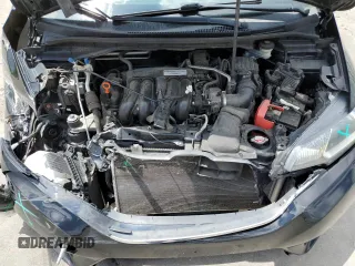 2015 Honda Fit EX-L z VIN 3HGGK5H80FM704920, wystawiony jako Copart lot #59834245 z przebiegiem 86 415 mil mil oraz Szkoda całkowita • Salvage title. Historia ofert i sprzedaży dostępna na DreamBid. Obrazek 11.