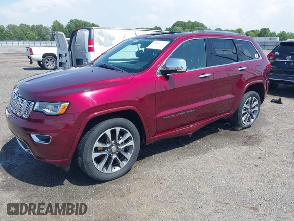 2017 Jeep Grand Cherokee Overland with VIN 1C4RJFCG7HC658943, listed as a IAAI auction lot 42282213 with 103,291 mi miles and . Bid and sale history available at DreamBid. Image 22.