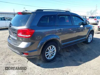 2014 Dodge Journey SXT with VIN 3C4PDCBG6ET192288, listed as a IAAI auction lot 41787594 with 132,973 mi miles. Bid and sale history available at carsss.com. Image 4.