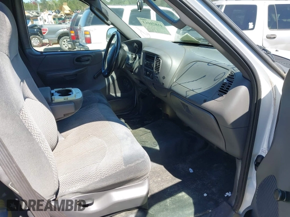 2003 Ford F-150 XL with VIN 1FTRX172X3NA59676, listed as a IAAI auction lot 41821013 with 249,483 mi miles. Bid and sale history available at carsss.com. Image 5.