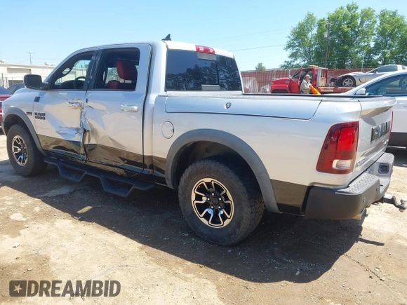 2016 Ram 1500 Rebel z VIN 1C6RR7YT7GS185173, wystawiony jako IAAI lot #42033684 z przebiegiem 152 758 mil mil oraz . Historia ofert i sprzedaży dostępna na DreamBid. Obrazek 3.