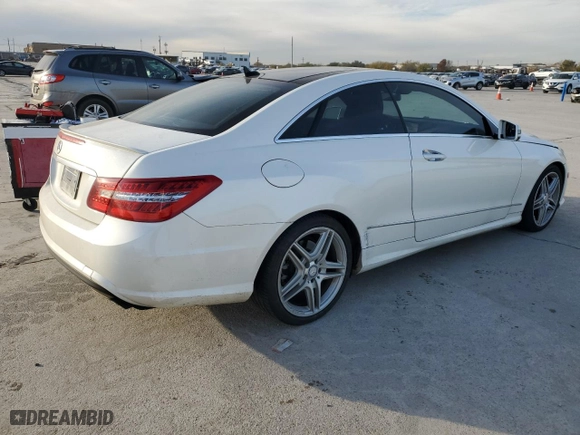 2011 Mercedes-Benz E-Class E 550 with VIN WDDKJ7CBXBF077136, listed as a Copart auction lot 83542054 with 125,274 mi miles and Salvage Title. Bid and sale history available at carsss.com. Image 3.