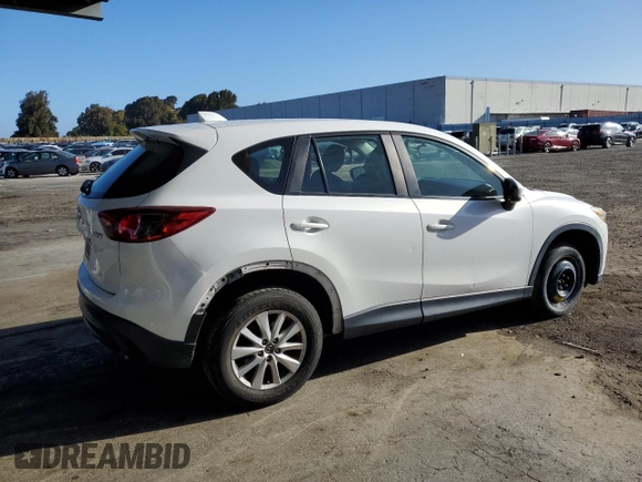2013 Mazda CX-5 Sport with VIN JM3KE2BE7D0148951, listed as a Copart auction lot 57782115 with 65,677 mi miles and Salvage title. Bid and sale history available at DreamBid. Image 3.