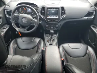 2022 Jeep Cherokee Trailhawk с VIN 1C4PJMBX1ND529146, выставлен на аукционе Copart как лот 56237365 с пробегом 26 718 миль миль и Списание • Salvage title. История ставок и продаж доступна на DreamBid. Изображение 8.