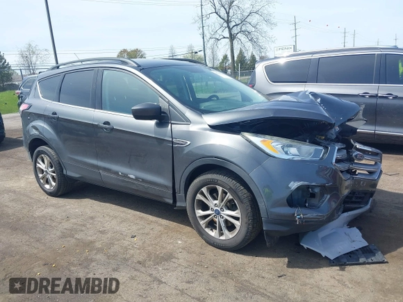 2017 Ford Escape SE z VIN 1FMCU0GD0HUE06774, wystawiony jako IAAI lot #42135955 z przebiegiem 141 807 mil mil oraz . Historia ofert i sprzedaży dostępna na DreamBid. Obrazek 1.