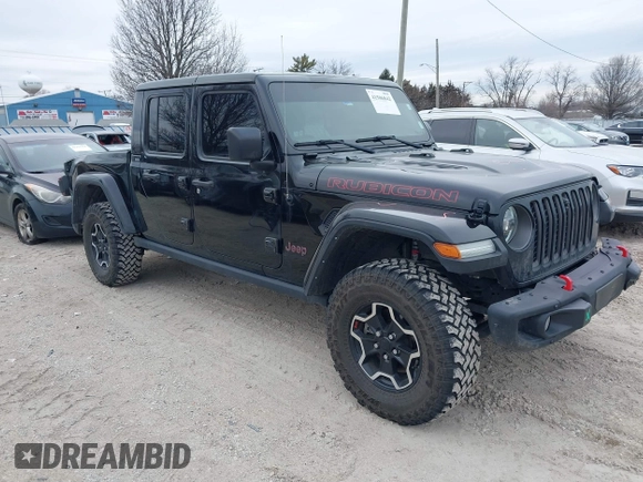 2022 Jeep Gladiator Rubicon with VIN 1C6JJTBG7NL145501, listed as a IAAI auction lot 41506842 with 20,593 mi miles and . Bid and sale history available at DreamBid. Image 1.