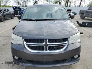 2014 Dodge Grand Caravan SXT 30th Anniversary with VIN 2C4RDGCG4ER285294, listed as a Copart auction lot 52109205 with 196,331 mi miles and Salvage Title. Bid and sale history available at DreamBid. Image 5.