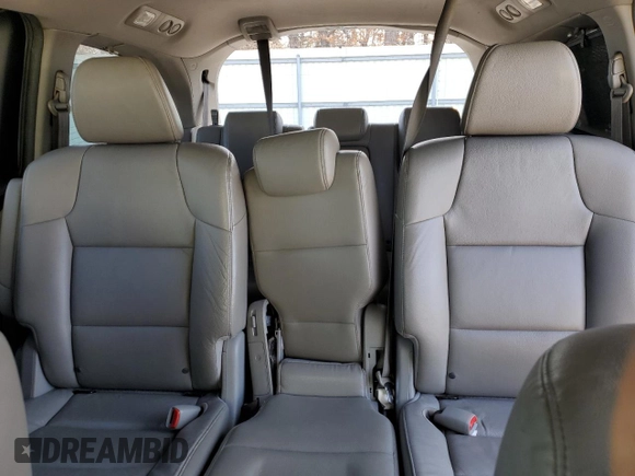 2014 Honda Odyssey Touring with VIN 5FNRL5H94EB094357, listed as a Copart auction lot 53930635 with 210,448 mi miles and Salvage Title. Bid and sale history available at carsss.com. Image 10.